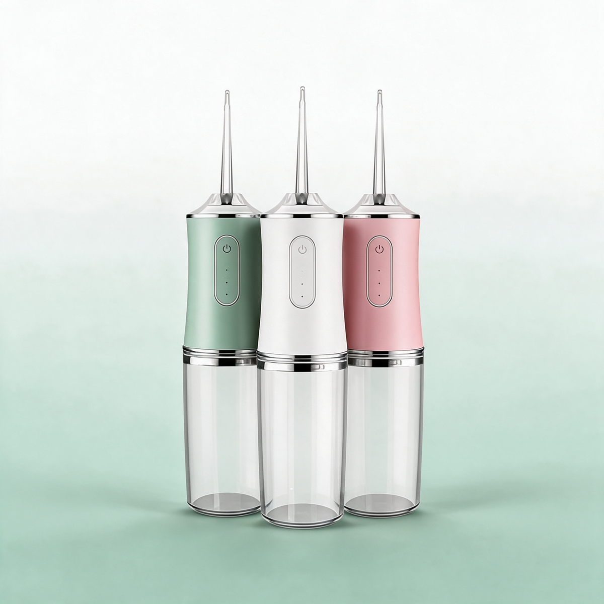 PureStream portable water flosser in Green, White, and Pink